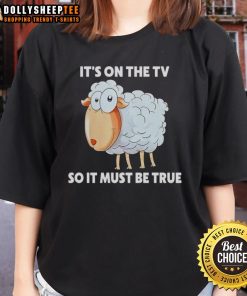 Original Sheep It's On The TV So It Must Be True Ladies Tee featuring a humorous sheep graphic on a stylish t-shirt.