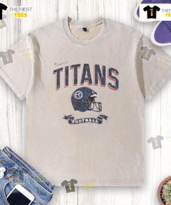 Alt Text: Original Tennessee Titans football helmet distressed design on a washed t-shirt, perfect for fans and casual wear.