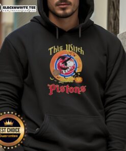 Alt Text: Snoopy Halloween hoodie featuring 'This Witch Loves The Detroit Pistons' design, perfect for Halloween fans and basketball lovers.