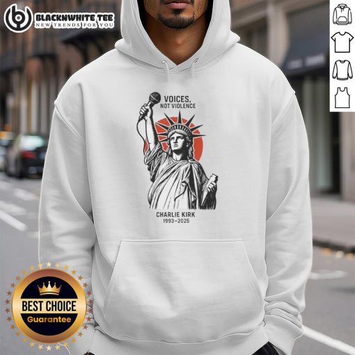 Alt Text: Charlie Kirk wearing a Original Voices Not Violence hoodie featuring the Statue of Liberty, 1993-2025.