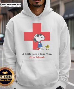 Premium American Red Cross Peanuts Snoopy hoodie with A Little Goes A Long Way slogan promoting blood donation.