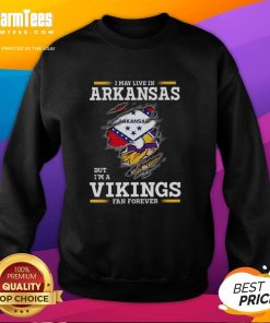 Premium sweatshirt featuring 'I May Live In Arkansas But I'm A Minnesota Vikings Fan Forever' design for football fans.