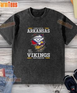 Premium washed t-shirt featuring 'I May Live In Arkansas But I'm A Minnesota Vikings Fan Forever' design.