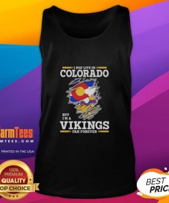 Premium tank top featuring 'I May Live In Colorado But I'm A Minnesota Vikings Fan Forever' design for fans.