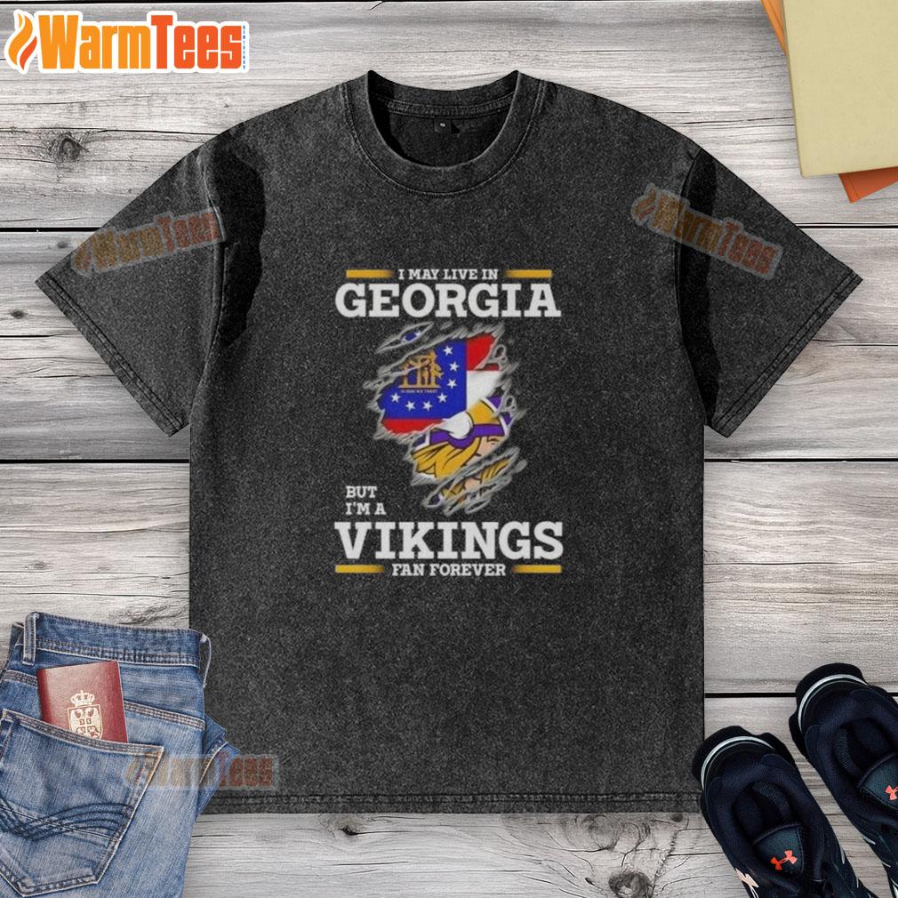 Premium I May Live In Georgia But I'm A Minnesota Vikings Fan Forever Washed T-Shirt Premium washed t-shirt featuring 'I may live in Georgia but I'm a Minnesota Vikings fan forever' design.