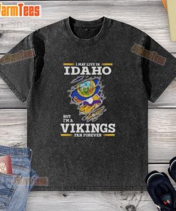 Premium washed t-shirt featuring 'I May Live In Idaho But I'm A Minnesota Vikings Fan Forever' design.