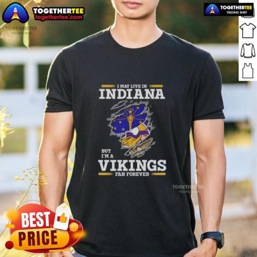Premium I May Live In Indiana But I'm A Minnesota Vikings Fan Forever T-Shirt featuring team colors and logo design.