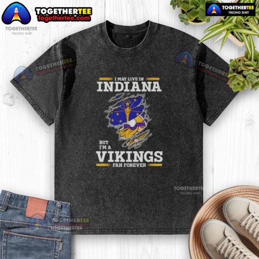 Premium washed t-shirt featuring 'I May Live In Indiana But I'm A Minnesota Vikings Fan Forever' design.