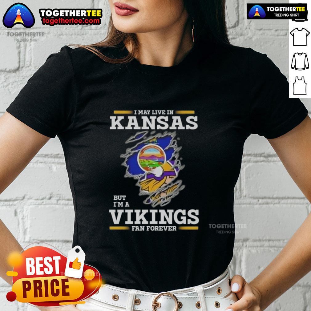 Premium I May Live In Kansas But I'M A Minnesota Vikings Fan Forever Ladies Tee Alt Text: Premium ladies tee featuring 'I May Live In Kansas But I'm A Minnesota Vikings Fan Forever' design.