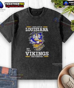 Premium I May Live In Louisiana But I'm A Minnesota Vikings Fan Forever Washed T-Shirt in purple and gold.