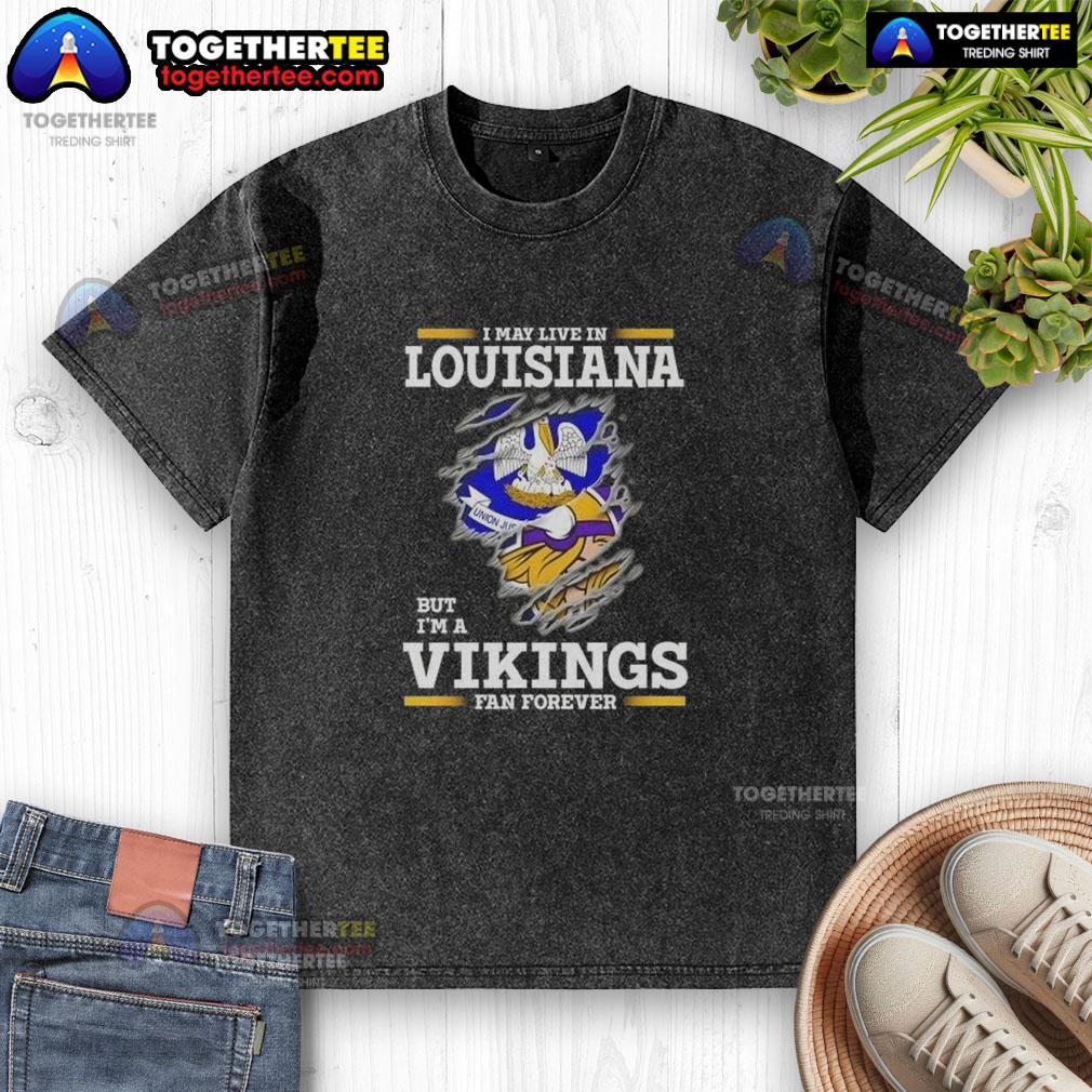 Premium I May Live In Louisiana But I'm A Minnesota Vikings Fan Forever Washed T-Shirt Premium I May Live In Louisiana But I'm A Minnesota Vikings Fan Forever Washed T-Shirt in purple and gold.
