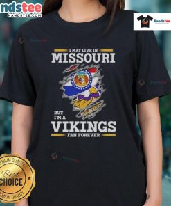 Premium ladies tee: 'I May Live in Missouri But I'm a Minnesota Vikings Fan Forever' showcasing team spirit and style.