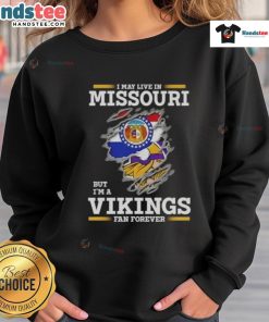 Premium sweatshirt featuring 'I May Live In Missouri But I'm A Minnesota Vikings Fan Forever' design for fans.