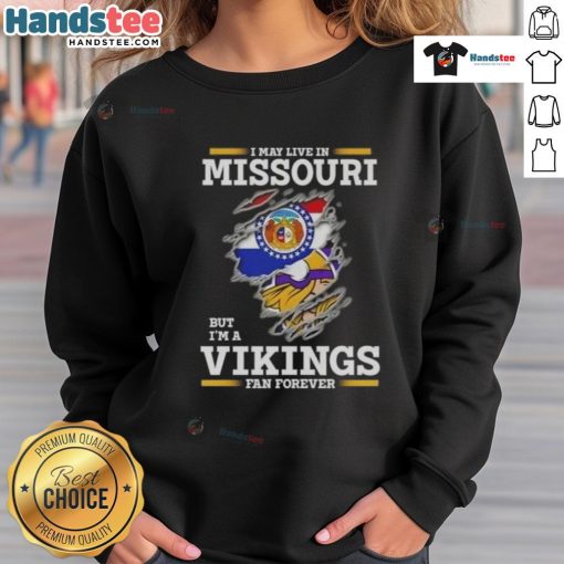 Premium sweatshirt featuring 'I May Live In Missouri But I'm A Minnesota Vikings Fan Forever' design for fans.