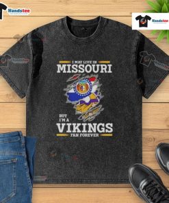 Premium washed t-shirt featuring 'I May Live In Missouri But I'm A Minnesota Vikings Fan Forever' design.