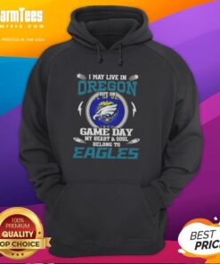 Alt Text: Premium hoodie with text 'I may live in Oregon but on game day my heart belongs to Philadelphia Eagles' design.