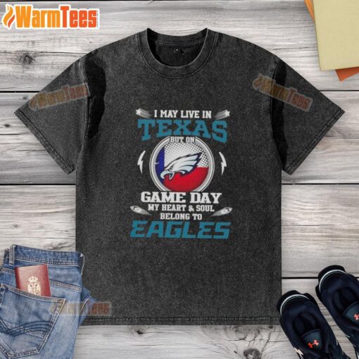 Premium washed t-shirt featuring 'I May Live In Texas, But My Heart Belongs To Philadelphia Eagles' design.