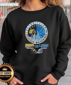 Premium Michigan Wolverines skyline sweatshirt featuring Detroit Lions helmets for ultimate game day style.