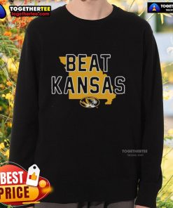 Premium Missouri Tigers sweatshirt featuring a bold design celebrating the team's victory over Kansas Jayhawks.