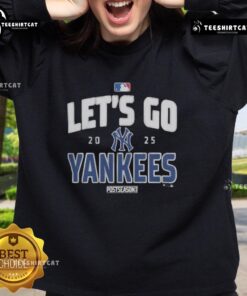 Alt Text: Premium New York Yankees Baseball 2025 Postseason sweatshirt featuring team logo and Let's Go Team design.
