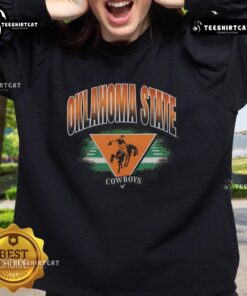 Alt Text: Premium Oklahoma State Cowboys vintage arena fade sweatshirt showcasing team spirit and classic style.