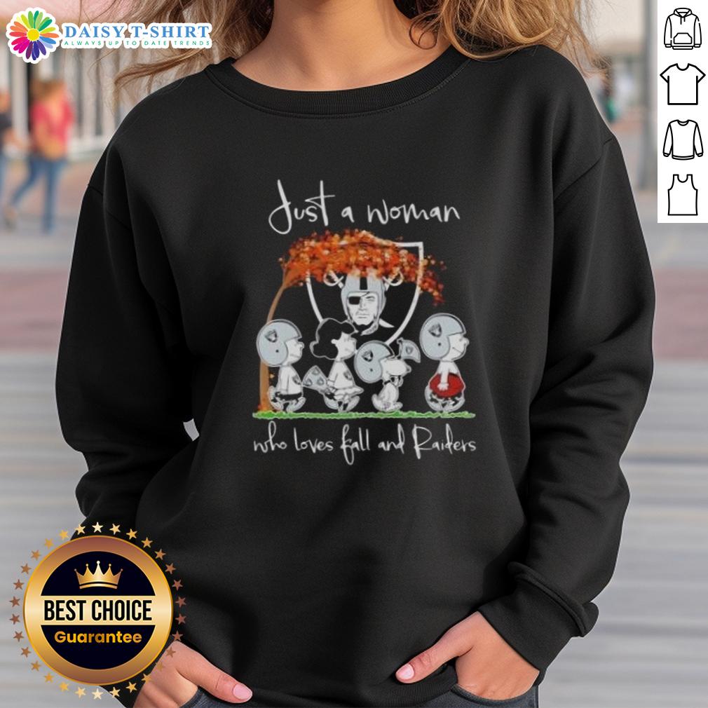 Premium Peanuts Just A Woman Who Loves Fall And Las Vegas Raiders Sweatshirt Woman wearing a Premium Peanuts sweatshirt, showcasing love for fall and the Las Vegas Raiders.