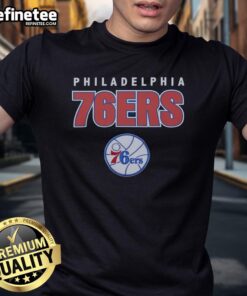 Alt Text: Premium Philadelphia 76ers throwback t-shirt featuring classic team logo and vibrant retro colors, perfect for fans.