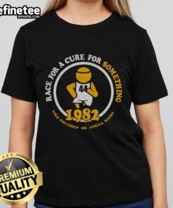 1982 Premium Race for a Cure Ladies Tee featuring vibrant graphics, supporting children's health initiatives in Africa.