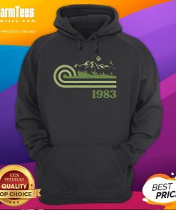 Premium Retro Vintage Forest Moon 1983 Hoodie displayed on a rustic wooden background with nature-inspired elements.