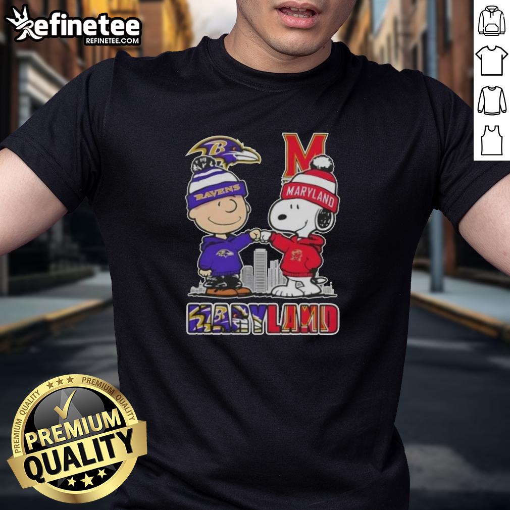 Premium Snoopy And Charlie Brown Baltimore Ravens X Maryland Terrapins Skyline T-Shirt Alt Text: Premium Snoopy and Charlie Brown Baltimore Ravens X Maryland Terrapins skyline t-shirt featuring vibrant graphics.