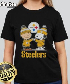 Premium Snoopy and Charlie Brown Pittsburgh Steelers Football Skyline Ladies Tee for stylish fans.