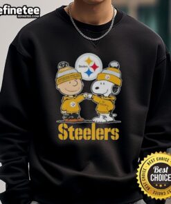 Alt Text: Premium Snoopy and Charlie Brown Pittsburgh Steelers football skyline sweatshirt featuring iconic characters and team logo.
