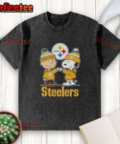 Premium Snoopy and Charlie Brown Pittsburgh Steelers football skyline washed t-shirt design featuring iconic characters.