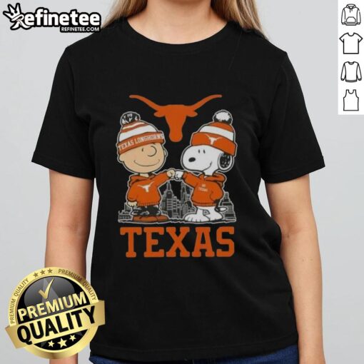 Premium Snoopy and Charlie Brown Texas Longhorns football skyline ladies tee featuring vibrant graphics and soft fabric.