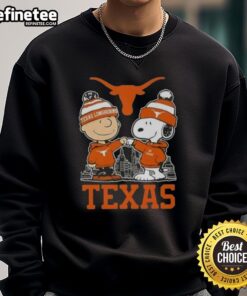 Premium Snoopy and Charlie Brown Texas Longhorns football skyline sweatshirt featuring vibrant graphics and cozy design.