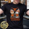 Alt Text: Premium Snoopy and Charlie Brown Texas Longhorns football skyline t-shirt featuring iconic characters in vibrant colors.