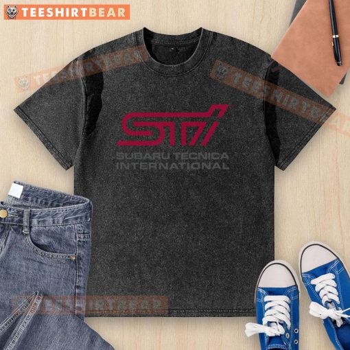 Alt Text: Premium STI logo on a Subaru Technica International washed t-shirt, showcasing automotive style and quality.