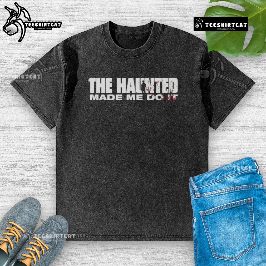 Premium The Haunted Made Me Do It Washed T Shirt Alt Text: Premium 'The Haunted Made Me Do It' washed t-shirt featuring a spooky design, perfect for Halloween enthusiasts.