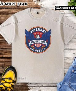 Alt Text: Premium Veterans On Patrol Protector Eagle Logo T-Shirt, featuring a stylish washed design for veterans.