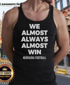 Premium Nebraska football tank top with 'We Almost Always Almost Win' graphic, perfect for fans and game day attire.