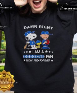 Snoopy and Charlie Brown on a sweatshirt celebrating Dodgers fandom - 'Pretty Damn Right I Am A Dodgers Fan Now And Forever.'