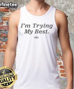 Alt Text: Pretty Dan Patrick in a stylish I'm Trying My Best tank top, showcasing a chic summer look with a confident smile.