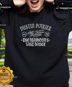 Alt Text: Dustin Poirier in a stylish boxy sweatshirt, 'The Diamond's Last Dance,' showcasing his UFC spirit and fashion.