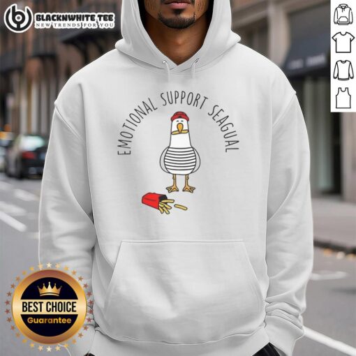 Pretty emotional support seagull in a hoodie enjoying french fries at the beach, showcasing a fun and quirky moment.