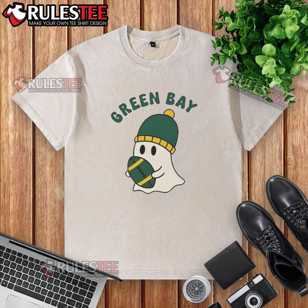 Pretty Green Bay Packers Ghost Football Halloween Washed T Shirt Pretty Green Bay Packers ghost football Halloween washed t-shirt featuring a spooky design perfect for game day.