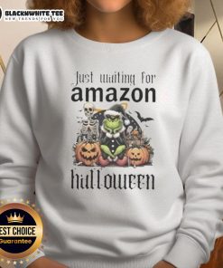 Alt Text: Pretty Grinch Halloween sweatshirt ready for Amazon shoppers, featuring festive design and vibrant colors.