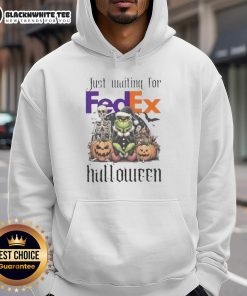 Alt Text: Pretty Grinch Halloween hoodie waiting for FedEx delivery, featuring festive design and vibrant colors for holiday spirit.