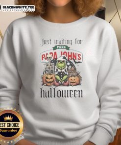 Alt Text: Pretty Grinch in Halloween sweatshirt waiting for Papa John's pizza, perfect for festive celebrations.