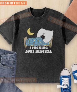 Pretty I Fucking Love Bedtime washed t-shirt displayed on a hanger, showcasing its soft fabric and casual style.