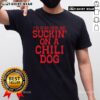 Alt Text: Pretty I'D Rather Be Suckin' On A Chili Dog T-Shirt featuring a fun graphic design for chili dog lovers.